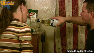 young couple drinks naked