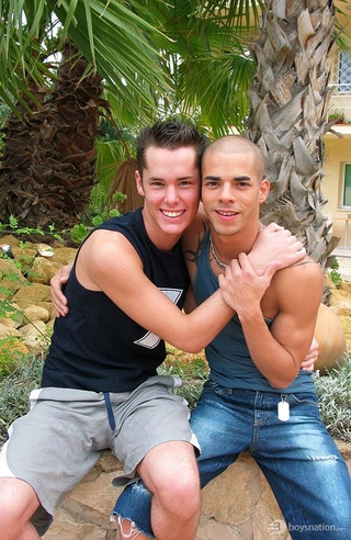 bald gay stud undressing