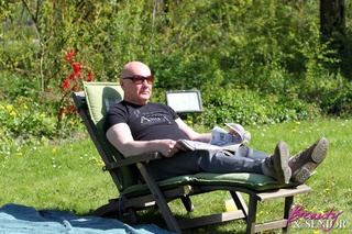 bald man sunglasses pounds