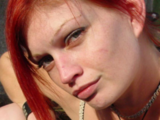 red-headed mom taking her