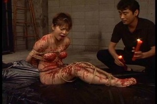 kinky guy torturing bound
