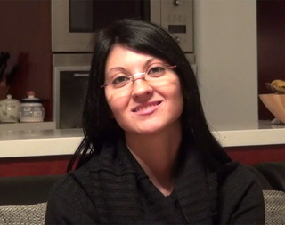 brunette chick glasses talking