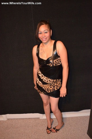 seductive exotic housewife posing