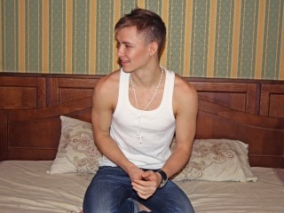 young man maksims close