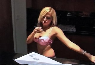 blonde reads magazine and
