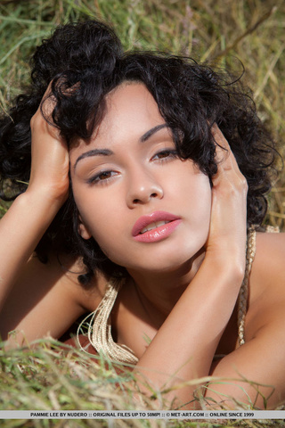 lusty chick lays topless