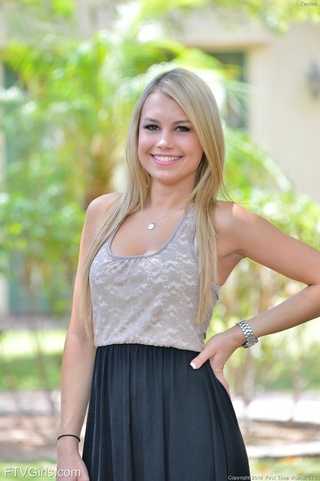 smiling blonde model showing