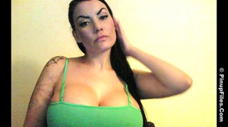 dark-haired tattooed milf flashes
