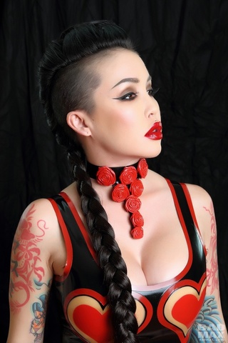 tattooed brunette showing favorite