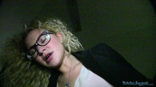 curly hair blonde glasses