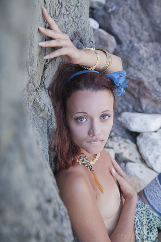 beautiful brunette babe lies