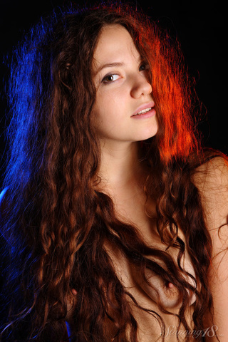 long haired curly brunette