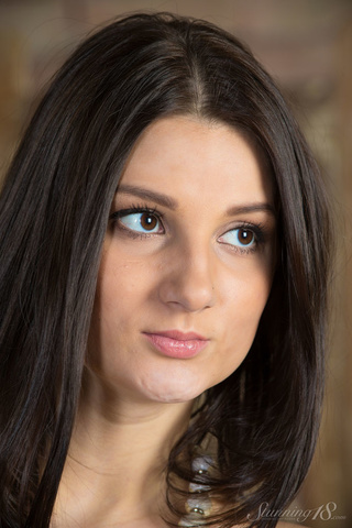 dark haired woman blue
