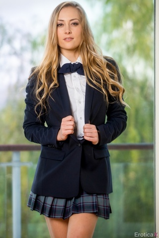 antalizing blonde wearing schoolgirl