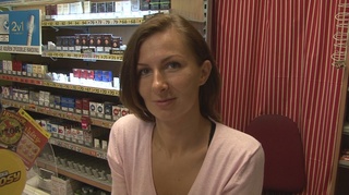 brunette shop assistant pink