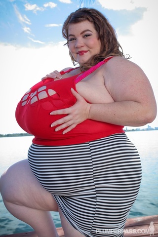 humongous babe takes red