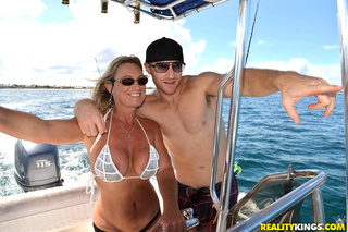 busty cougar barely bikini