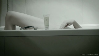 blonde sits bathtub nice