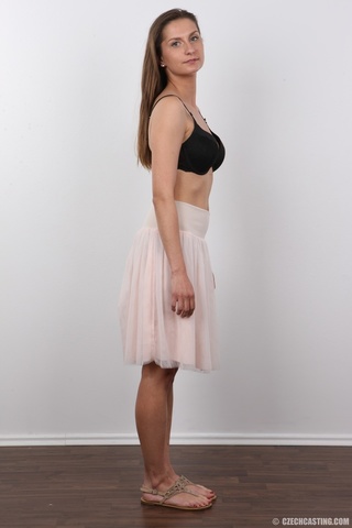 conservative brunette undresses reveals