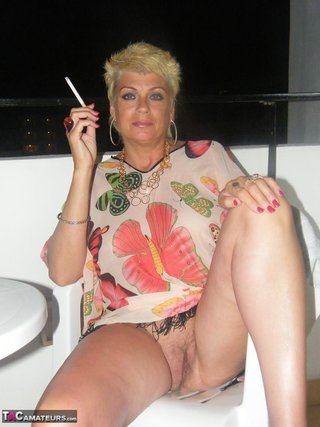 blonde milf spreads legs