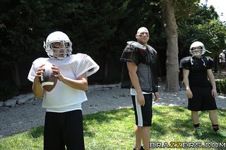 cute football players sits