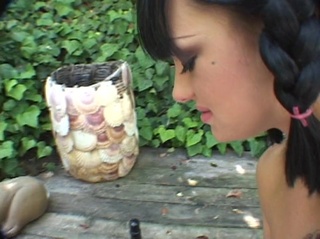 pigtailed brunette stretched pierced