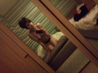 alternative-looking brunette shows lingerie