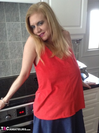 busty grandma red top