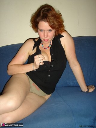 grandes breasted pelirroja cuero