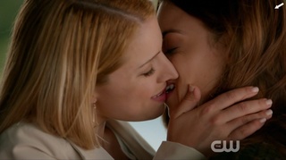 blonde brunette kissing sensual