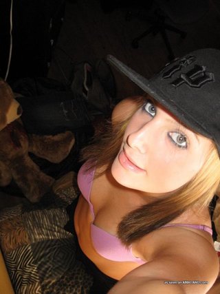 snapback-wearing blonde takes purple