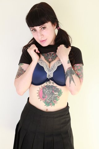 tattoed brunette